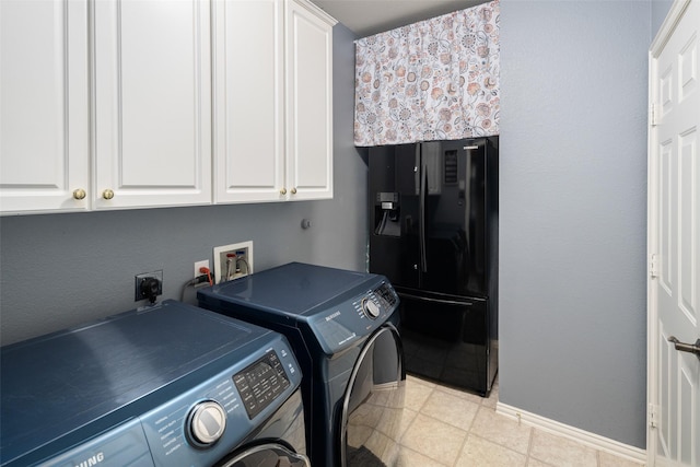 4309 Founders Dr, Rowlett, TX 75089 - laundry room featuring cabinet space and washing machine and clothes dryer