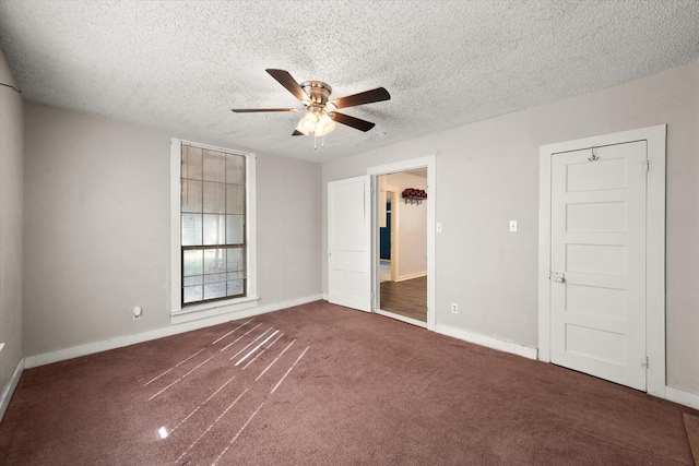 318 Mckenzie St, Waxahachie, TX 75165 - unfurnished bedroom featuring a textured ceiling, carpet, and a ceiling fan