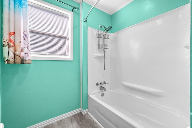 318 Mckenzie St, Waxahachie, TX 75165 - full bath with wood finished floors and shower / bathtub combination