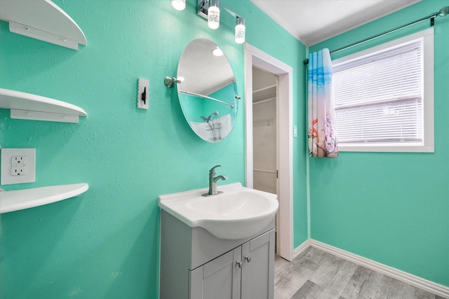 318 Mckenzie St, Waxahachie, TX 75165 - bathroom featuring vanity and wood finished floors