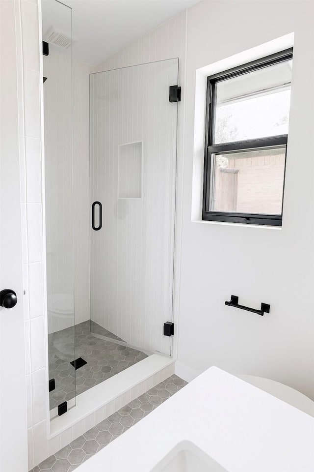422 Birch Ln, Richardson, TX 75081 - full bathroom with a stall shower and tile patterned flooring
