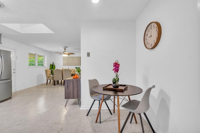 5624 Waltham Ave, Fort Worth, TX 76133 - dining room featuring a skylight and a ceiling fan