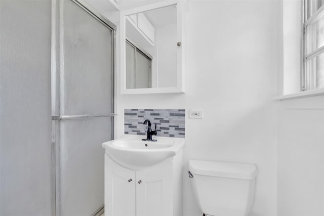 5624 Waltham Ave, Fort Worth, TX 76133 - bathroom featuring decorative backsplash, vanity, and a shower with shower door