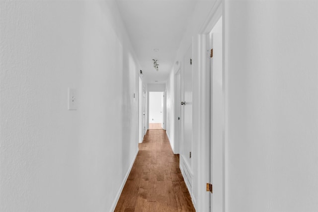 5624 Waltham Ave, Fort Worth, TX 76133 - hallway with wood finished floors and baseboards