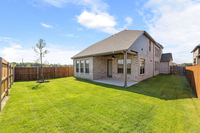 1957 Jade Forest Ln, Mesquite, TX 75181 - rear view of property with brick siding, ceiling fan, a fenced backyard, a patio, and a shingled roof