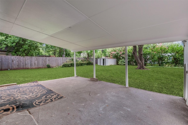 1712 Arbor Ln, Arlington, TX 76010 - fenced backyard featuring a patio area and a storage shed