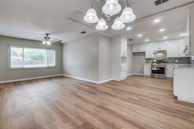 1712 Arbor Ln, Arlington, TX 76010 - unfurnished living room with attic access, ceiling fan, light wood finished floors, recessed lighting, and crown molding