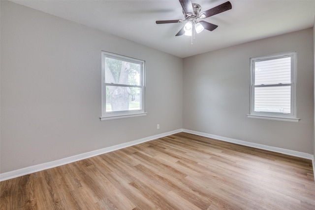 1712 Arbor Ln, Arlington, TX 76010 - spare room with light wood-style floors and ceiling fan