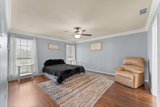 3227 Baskin Dr, Lancaster, TX 75134 - bedroom featuring crown molding, multiple windows, dark wood-type flooring, and a ceiling fan