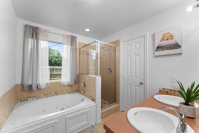 3227 Baskin Dr, Lancaster, TX 75134 - bathroom featuring a shower stall, a whirlpool tub, double vanity, tile patterned floors, and recessed lighting