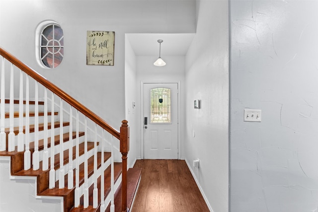 3227 Baskin Dr, Lancaster, TX 75134 - entryway with dark wood-style flooring and stairway