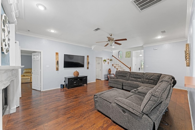 3227 Baskin Dr, Lancaster, TX 75134 - living room with stairway, a ceiling fan, a fireplace, recessed lighting, and wood finished floors