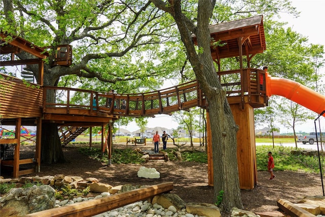 2021 Jade Frst, Mesquite, TX 75181 - view of jungle gym featuring stairs and a wooden deck