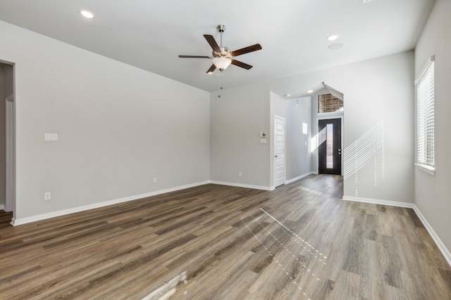 2021 Jade Frst, Mesquite, TX 75181 - unfurnished living room featuring plenty of natural light, a ceiling fan, wood finished floors, and recessed lighting