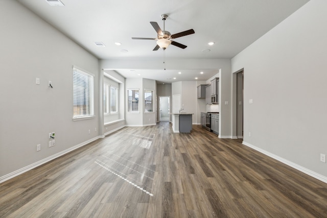 2021 Jade Frst, Mesquite, TX 75181 - unfurnished living room featuring wood finished floors, a ceiling fan, and recessed lighting