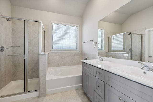 2021 Jade Frst, Mesquite, TX 75181 - full bathroom with a stall shower, a bath, double vanity, vaulted ceiling, and tile patterned flooring
