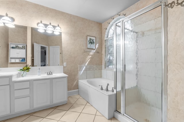 1 Cimarron Ct, Trophy Club, TX 76262 - bathroom featuring tile patterned floors, a bath, a shower stall, and double vanity