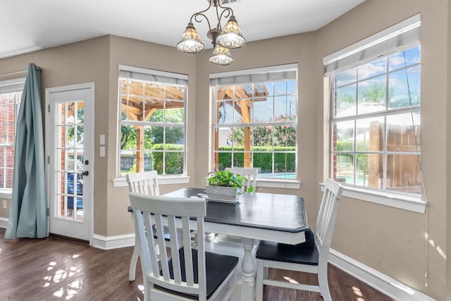 1 Cimarron Ct, Trophy Club, TX 76262 - dining space featuring a chandelier, dark wood-style floors, and healthy amount of natural light
