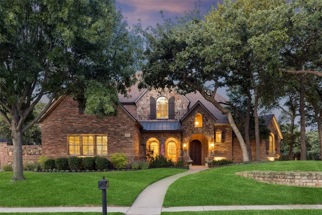1801 Kinsale Dr, Keller, TX 76262 - view of front of house featuring a standing seam roof, a yard, and brick siding