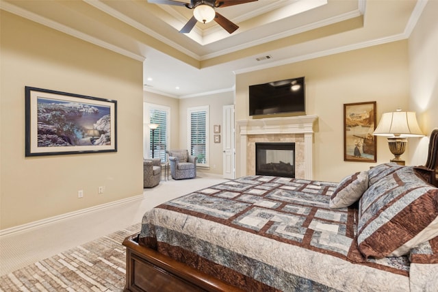 1801 Kinsale Dr, Keller, TX 76262 - bedroom with carpet floors, a raised ceiling, ornamental molding, and a tiled fireplace