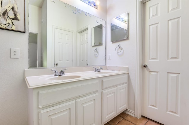 1015 Seider Ln, Grand Prairie, TX 75052 - full bath featuring double vanity and tile patterned floors