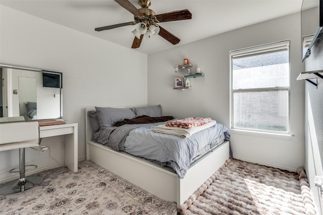 1015 Seider Ln, Grand Prairie, TX 75052 - bedroom featuring multiple windows and a ceiling fan