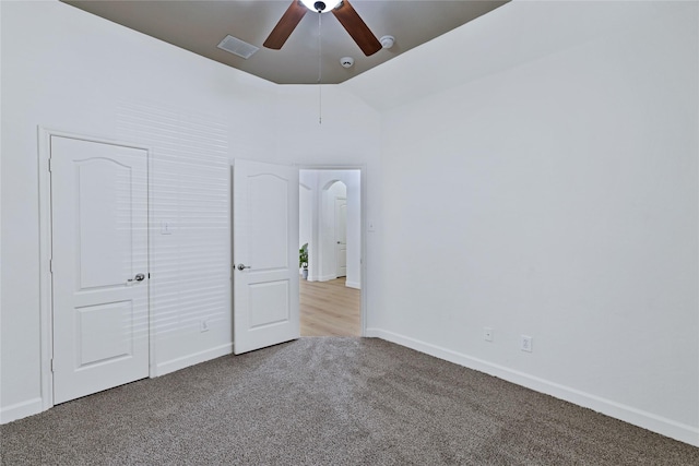 7064 Dreammaker Way, Frisco, TX 75035 - unfurnished bedroom featuring carpet, lofted ceiling, and a ceiling fan