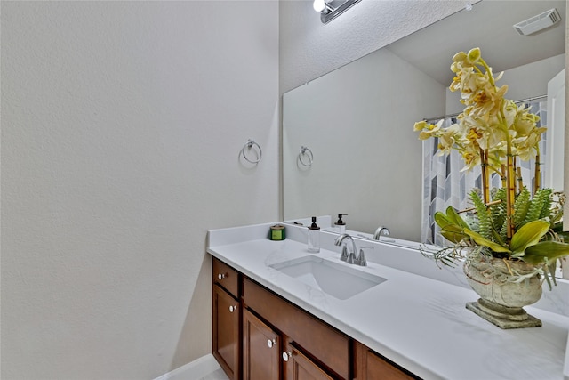 7064 Dreammaker Way, Frisco, TX 75035 - bathroom featuring vanity and curtained shower
