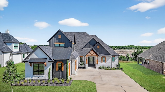 2028 Fox Bend Trce, Gunter, TX 75058 - modern farmhouse featuring board and batten siding, driveway, brick siding, and a front yard