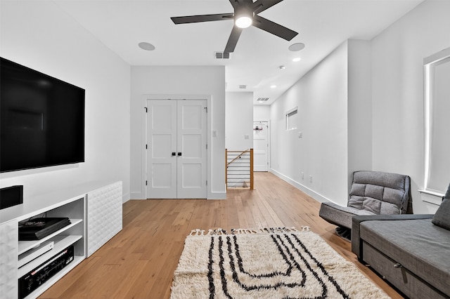 2028 Fox Bend Trce, Gunter, TX 75058 - sitting room featuring an upstairs landing, light wood finished floors, ceiling fan, and recessed lighting