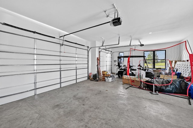 2028 Fox Bend Trce, Gunter, TX 75058 - garage featuring a garage door opener