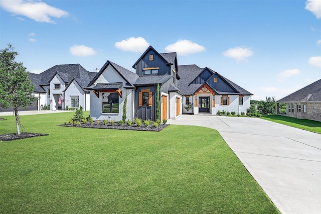 2028 Fox Bend Trce, Gunter, TX 75058 - modern farmhouse featuring board and batten siding, a standing seam roof, concrete driveway, and a front lawn