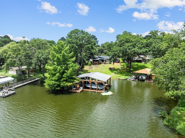 15781 Cedar Bay Dr, Bullard, TX 75757 - dock featuring boat lift, a water view, and view of scattered trees