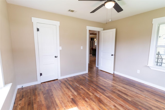 111 W Clinton Ave, Athens, TX 75751 - unfurnished bedroom with wood finished floors and a ceiling fan