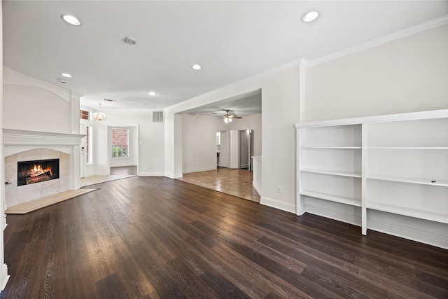 4816 Club View Cir, Mesquite, TX 75150 - unfurnished living room with wood finished floors, ornamental molding, recessed lighting, a fireplace, and a chandelier