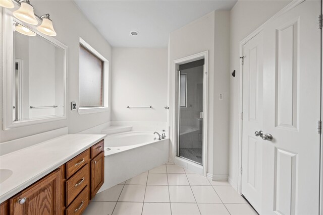 4816 Club View Cir, Mesquite, TX 75150 - bathroom with vanity, a garden tub, a shower stall, and tile patterned floors