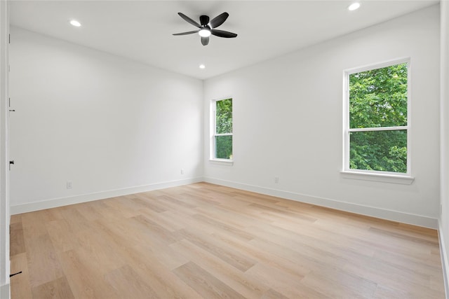1706 Homeland St, Dallas, TX 75212 - empty room featuring light wood-style flooring, a ceiling fan, and recessed lighting