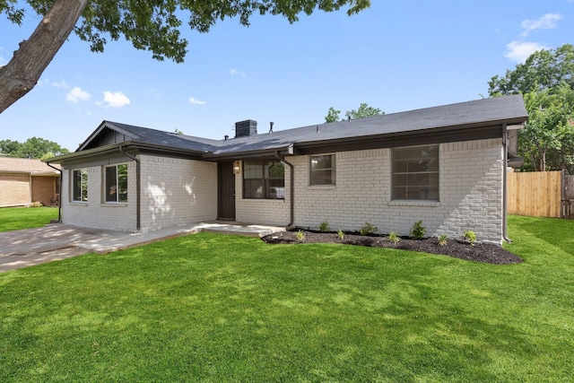 719 Sara Dr, Mesquite, TX 75149 - single story home featuring brick siding and a chimney