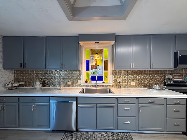 1915 N Jackson St, Palestine, TX 75803 - kitchen featuring stainless steel appliances, light countertops, and tasteful backsplash