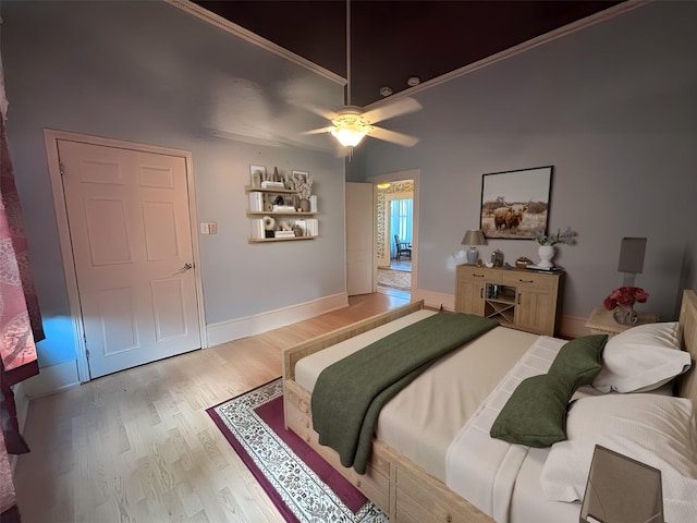 1915 N Jackson St, Palestine, TX 75803 - bedroom with crown molding, light wood finished floors, and ceiling fan