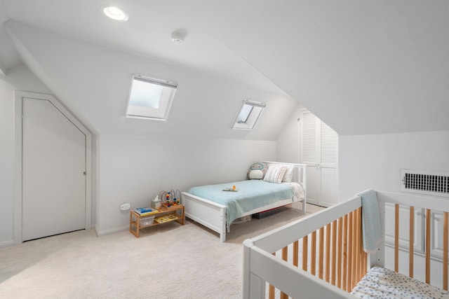 3216 Lovers Ln, University Park, TX 75225 - carpeted bedroom with vaulted ceiling and a skylight
