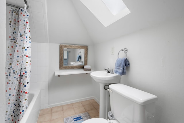 3216 Lovers Ln, University Park, TX 75225 - full bathroom featuring a skylight, tile patterned floors, shower / tub combo, and vaulted ceiling