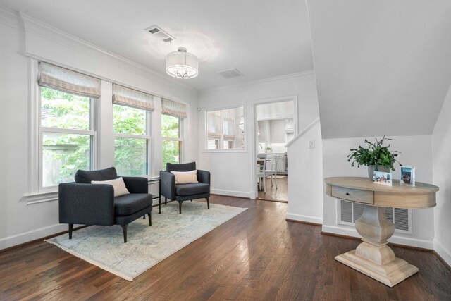 3216 Lovers Ln, University Park, TX 75225 - living area with dark wood-type flooring, a chandelier, and ornamental molding
