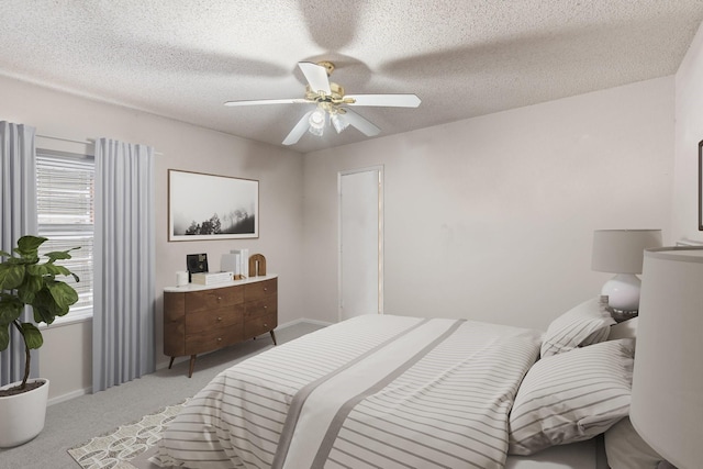 808 Elbe Dr, Arlington, TX 76001 - bedroom with carpet, a textured ceiling, and a ceiling fan