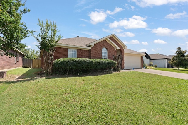 808 Elbe Dr, Arlington, TX 76001 - ranch-style house with brick siding, concrete driveway, and a garage