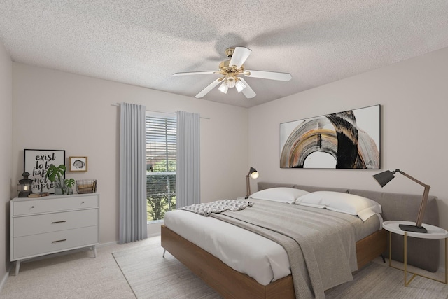 808 Elbe Dr, Arlington, TX 76001 - bedroom featuring light colored carpet, a textured ceiling, and ceiling fan
