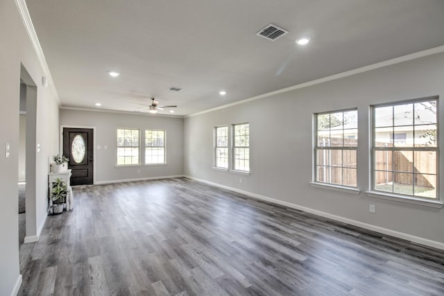 205 John Fielder, Sherman, TX 75092 - unfurnished living room with crown molding, recessed lighting, a ceiling fan, and dark wood-type flooring