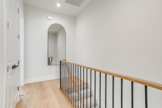 123 Thornton St, Arlington, TX 76013 - corridor with light wood-style floors, an upstairs landing, and recessed lighting