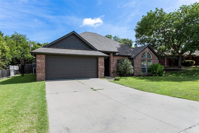 1526 Shadow Run, Weatherford, TX 76086 - ranch-style house featuring driveway, a garage, and brick siding