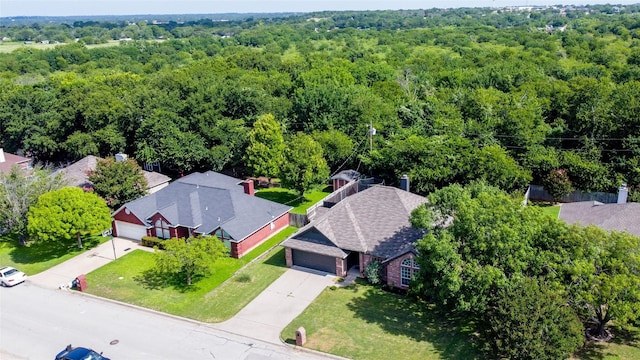 1526 Shadow Run, Weatherford, TX 76086 - view of subject property featuring a heavily wooded area